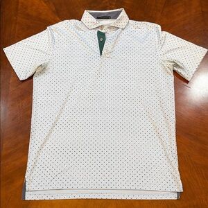 Greyson Polo with blue emblem and Green Accent perfect for summer and athletic